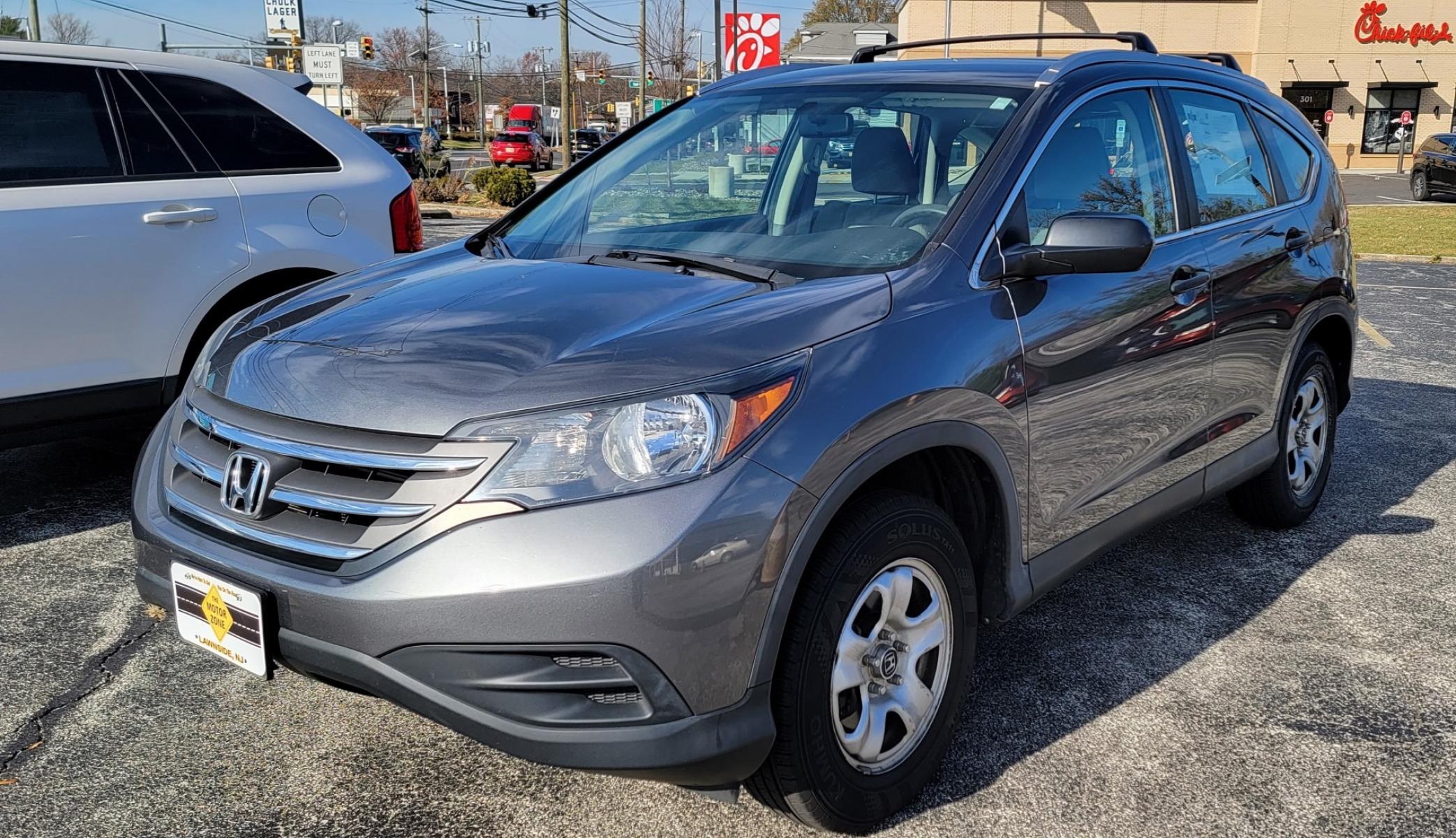 2012 Gray /Gray Honda CR-V LX (5J6RM4H3XCL) with an 4-Cyl, i-VTEC, 2.4 engine, Automatic transmission, located at 341 N White Horse Pike, Lawnside, NJ, 08045, (856) 262-9500, 39.855621, -75.027451 - Photo #0